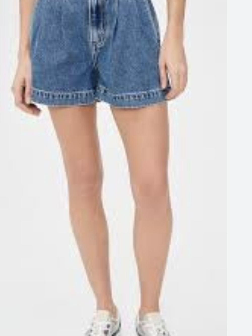 Madewell pleated denim shorts, which typically feature a vintage-inspired, relax